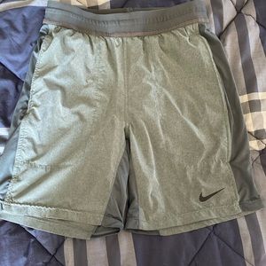 Men’s grey Nike yoga shorts excellent condition. Size small